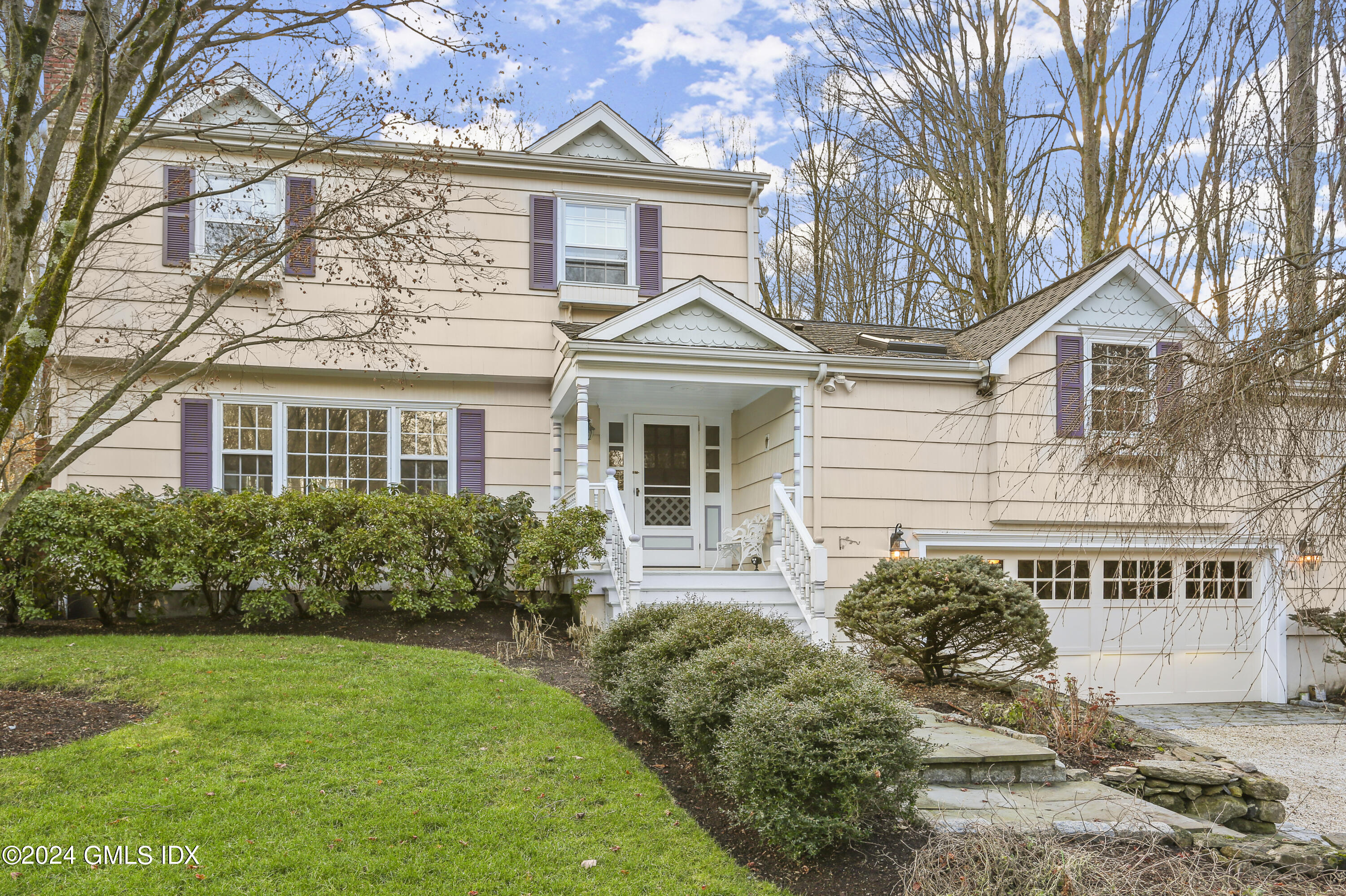 356 Haviland Road Stamford, CT 06903 - Photo 1 of 40 a front view of a house with garden