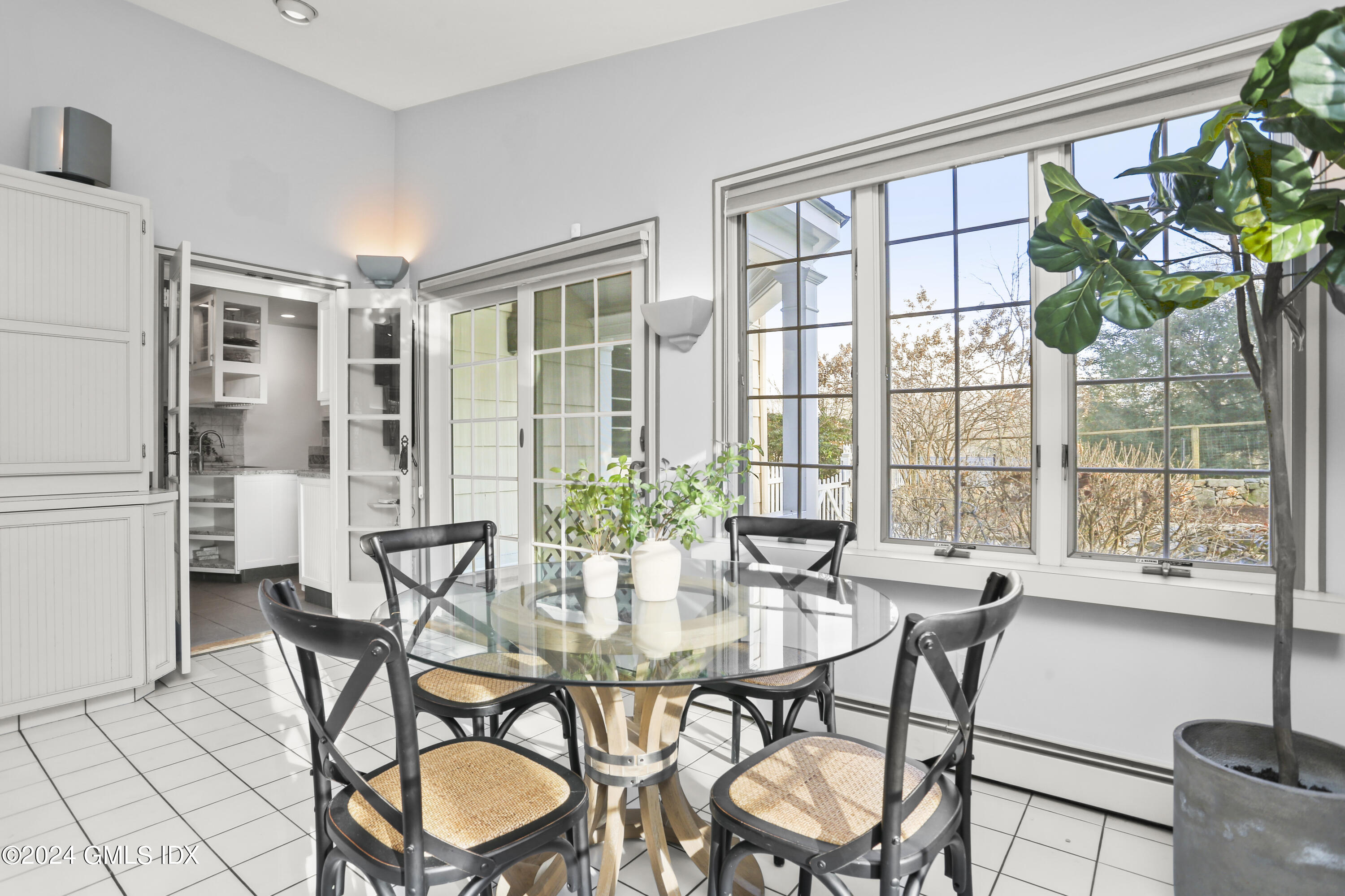 356 Haviland Road Stamford, CT 06903 - Photo 14 of 40 a view of a dining room with furniture window and outside view