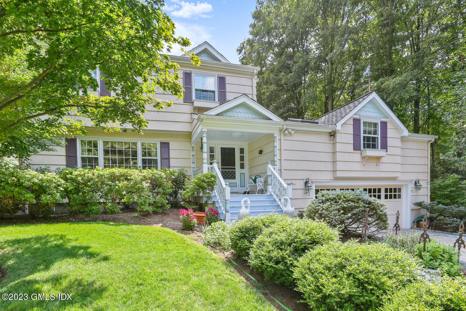 356 Haviland Road Stamford, CT 06903 - Photo 2 of 40 front view of a house with a yard
