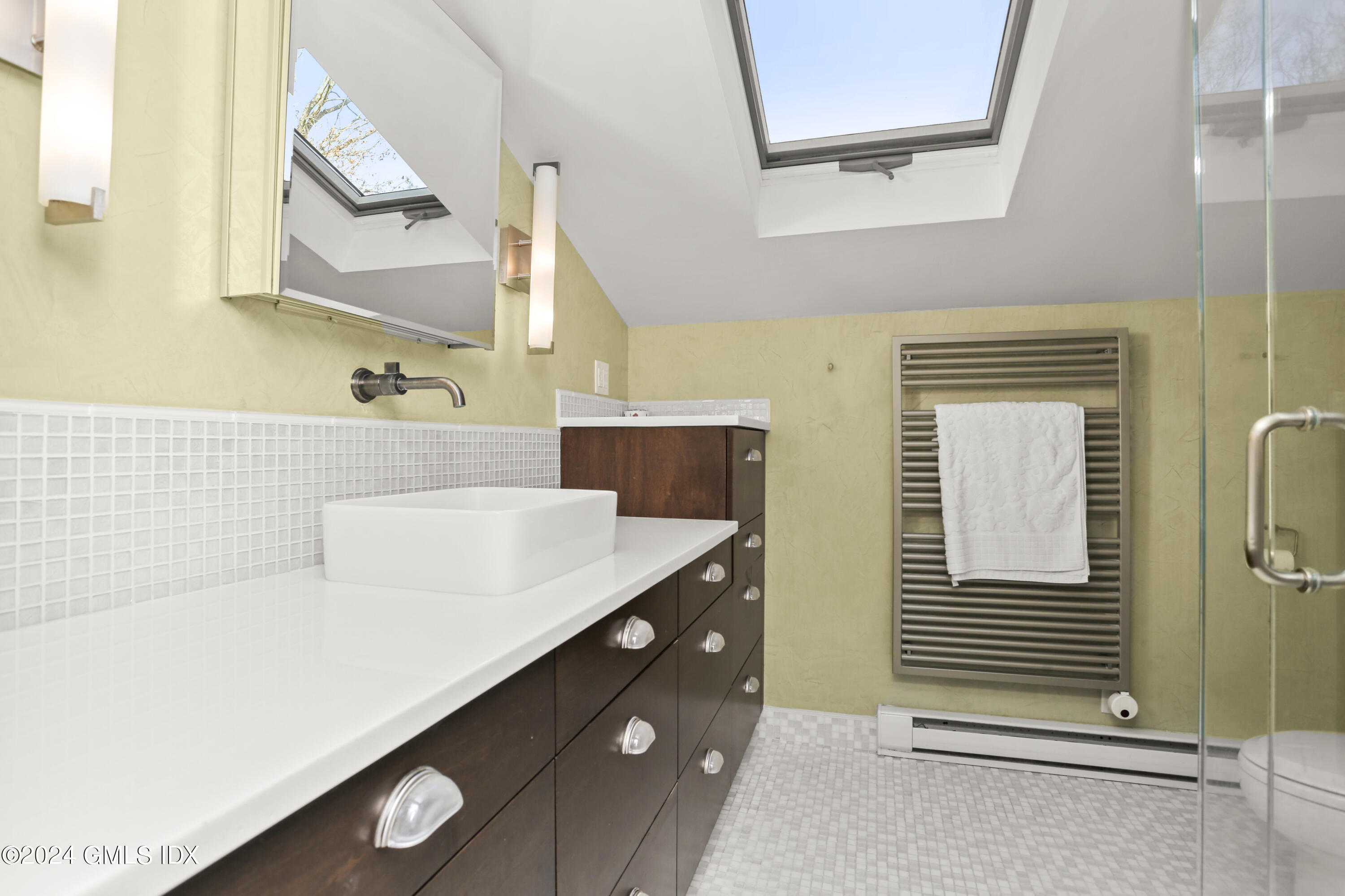 356 Haviland Road Stamford, CT 06903 - Photo 24 of 40 a bathroom with a sink and a mirror