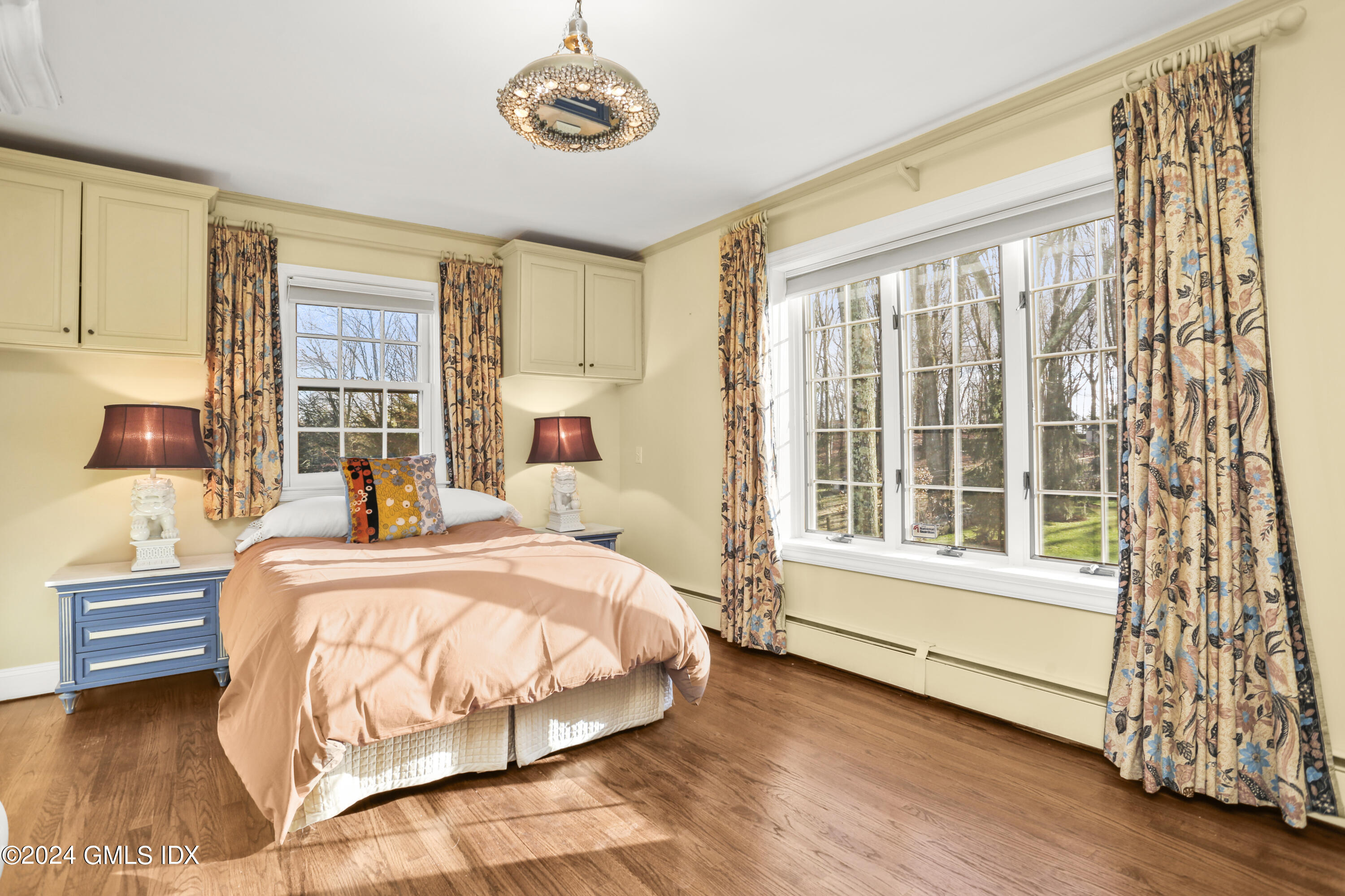 356 Haviland Road Stamford, CT 06903 - Photo 26 of 40 a bedroom with a bed and a large window
