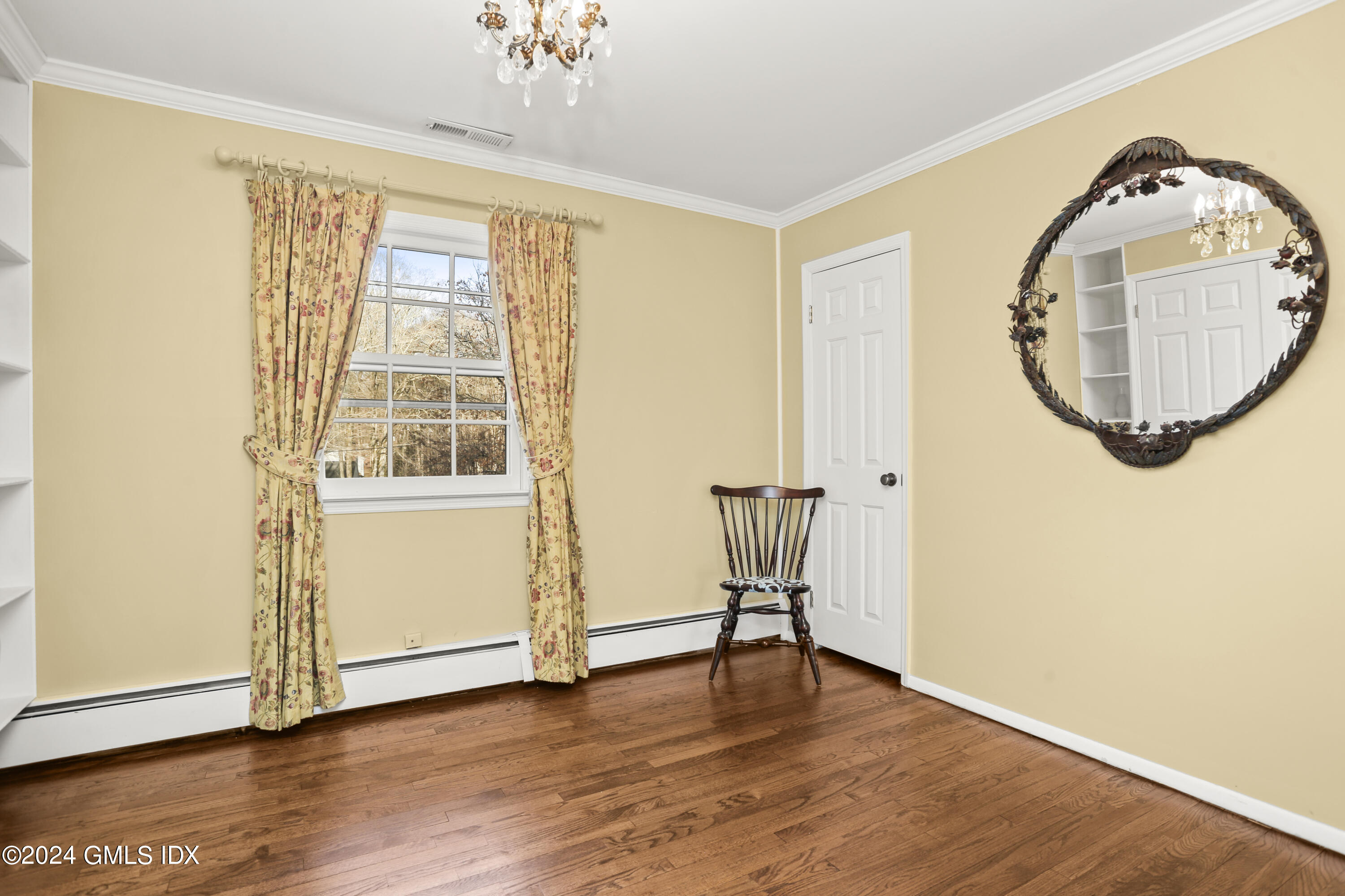 356 Haviland Road Stamford, CT 06903 - Photo 30 of 40 a view of a livingroom with wooden floor and a window