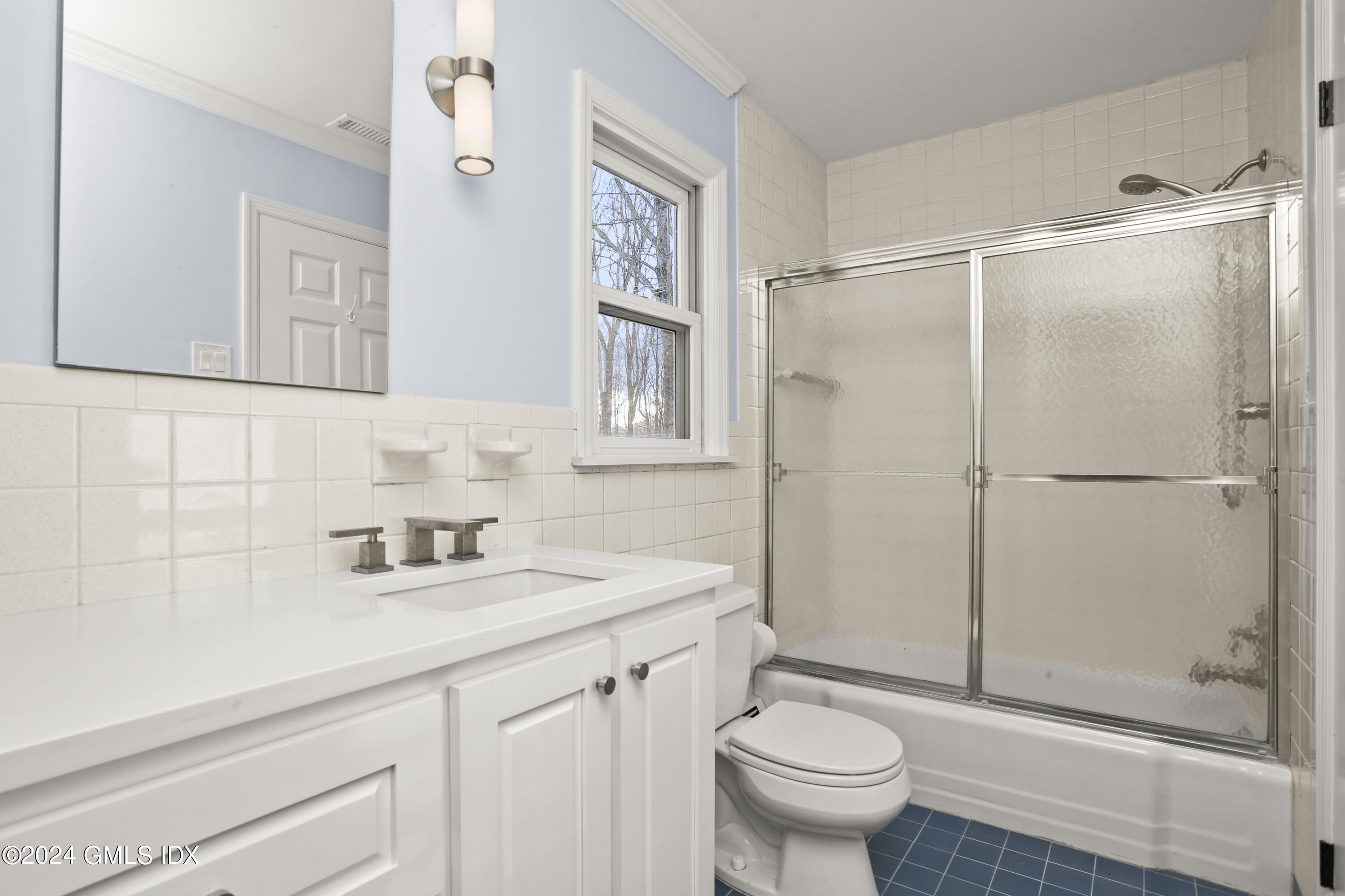 356 Haviland Road Stamford, CT 06903 - Photo 31 of 40 a bathroom with a sink toilet and shower