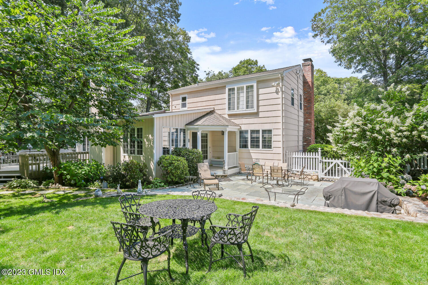 356 Haviland Road Stamford, CT 06903 - Photo 36 of 40 a view of a house with backyard and sitting area