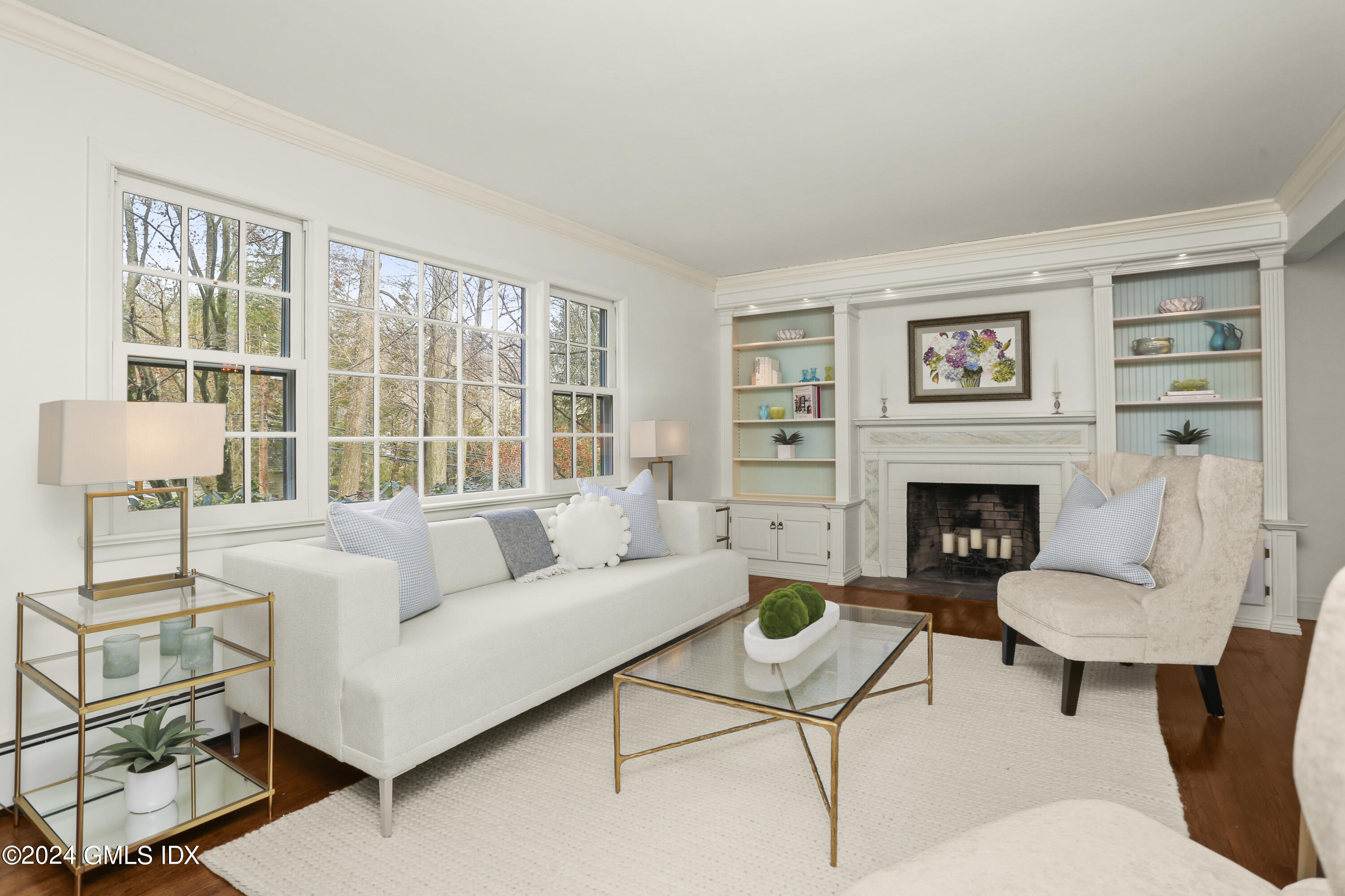 356 Haviland Road Stamford, CT 06903 - Photo 5 of 40 a living room with furniture and a fireplace