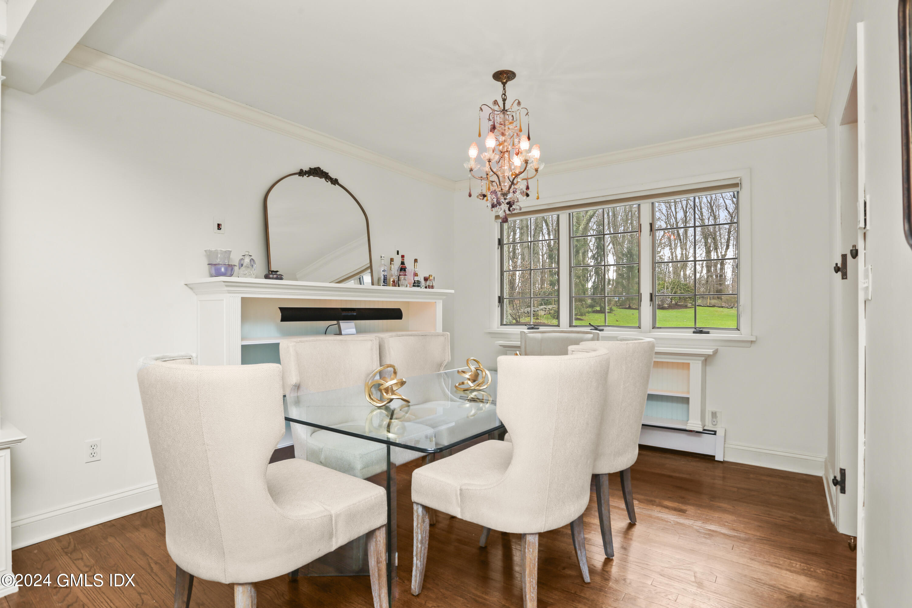 356 Haviland Road Stamford, CT 06903 - Photo 9 of 40 a view of a dining room with furniture wooden floor and chandelier