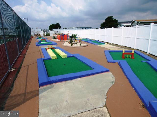 160 Clamshell Road Ocean City, MD 21842 - Photo 23 of 32 a view of a backyard with swimming pool