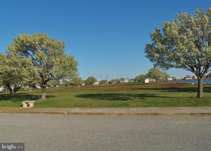 160 Clamshell Road Ocean City, MD 21842 - Photo 29 of 32 a front view of a house with a yard