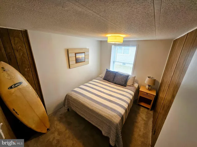 a view of room with stairs and a window