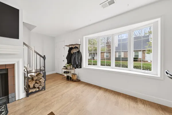 a kitchen with a stove and cabinets