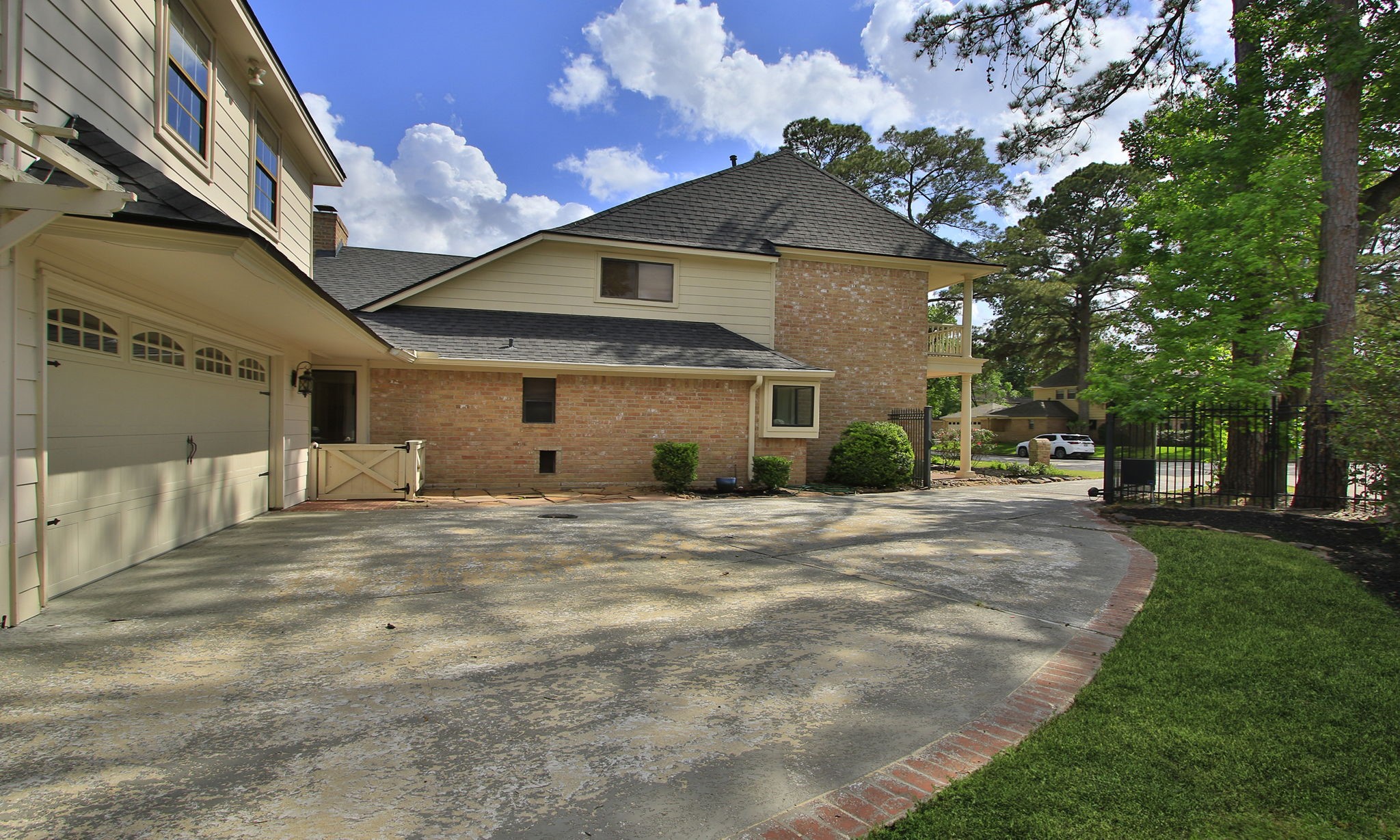16114 Kempton Park Drive Spring, TX 77379 - Photo 45 of 46 PLENTY OF PARKING - Behind the electric gate is great parking including a carport on the side of the garage.