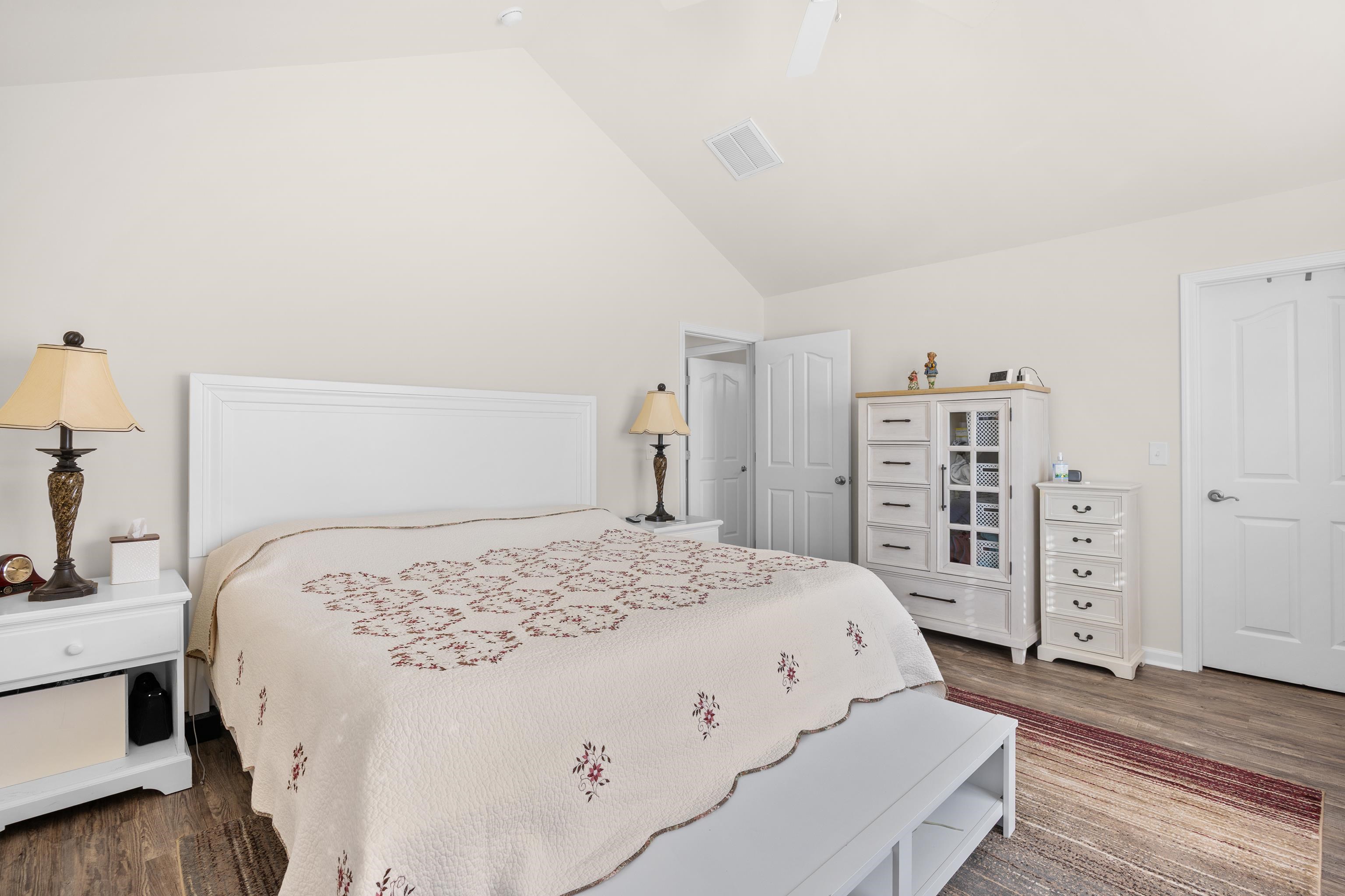 340 Arlington Circle, Unit 340 Murrells Inlet, SC 29576 - Photo 17 of 39 Vaulted ceilings and a large walk-in closet for your personal belongings.