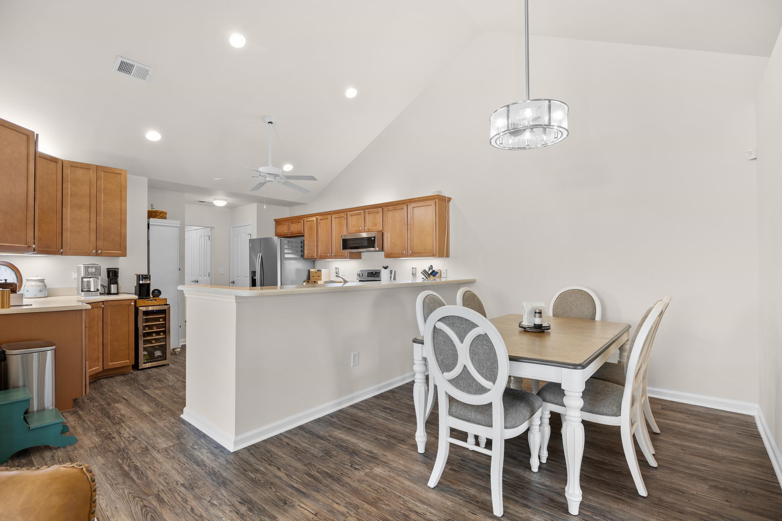 340 Arlington Circle, Unit 340 Murrells Inlet, SC 29576 - Photo 23 of 39 The dining area can accommodate a large table.