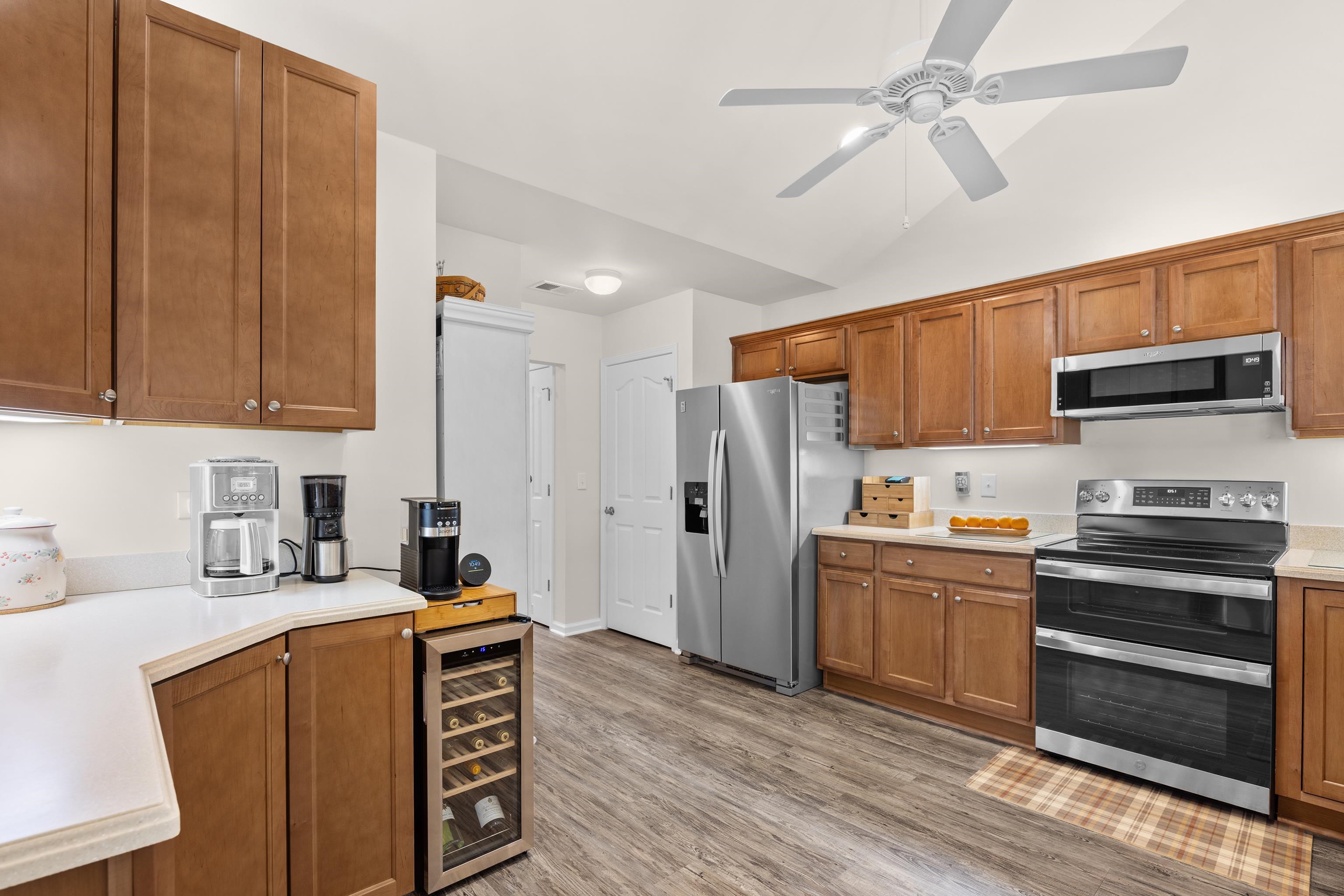 340 Arlington Circle, Unit 340 Murrells Inlet, SC 29576 - Photo 25 of 39 The cabinets in the corner were added to match the cabinets and countertops in the kitchen.