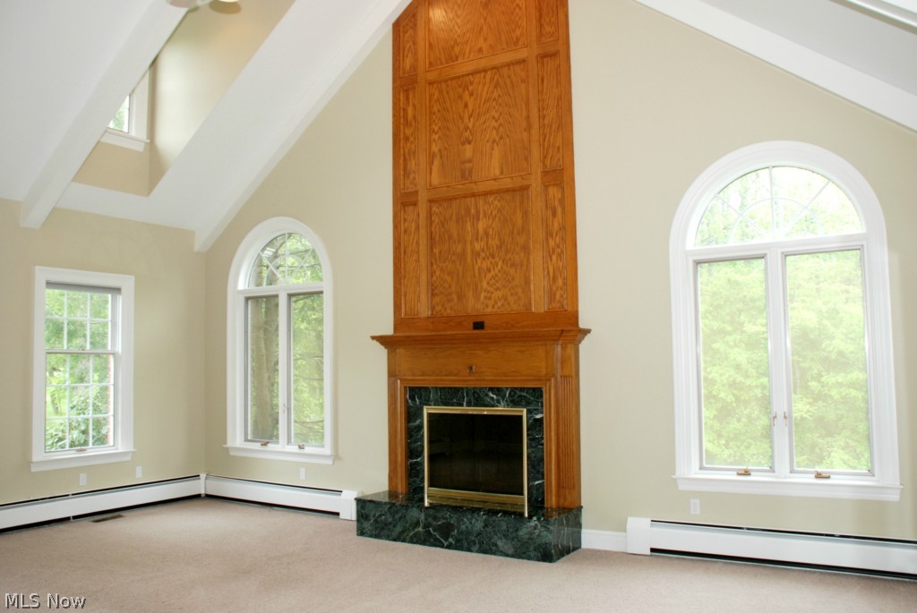 2890 Roundhill Road Akron, OH 44333 - Photo 6 of 25 STUNNING GREAT ROOM WITH LOADS OF WINDOWS, SOARING CEILINGS, FRENCH DOORS TO DECK,
