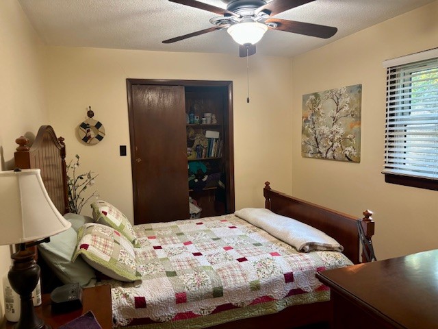 2258 South Williams Road Greenbrier, TN 37073 - Photo 18 of 23 a bedroom with a bed and a chandelier