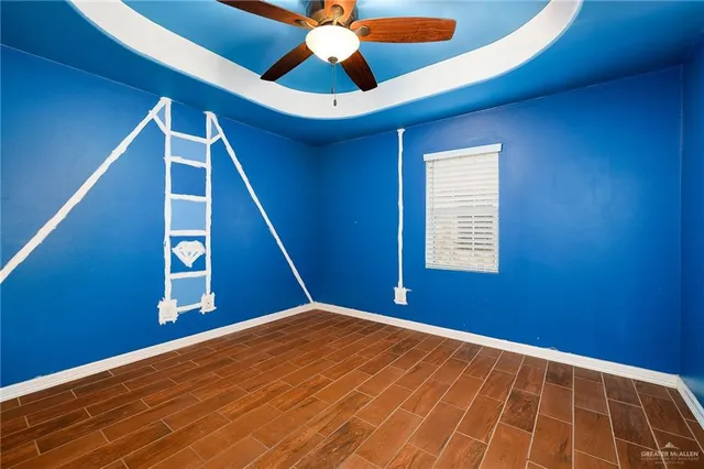 a view of empty room with windows