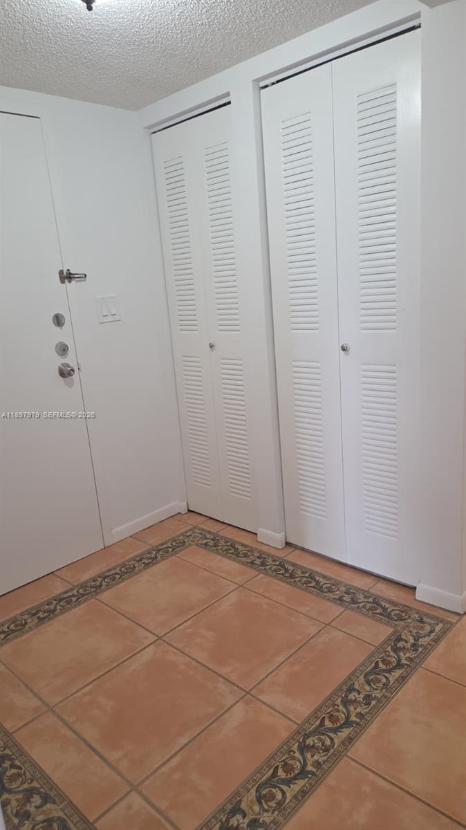 5249 Northwest 7th Street, Unit 418 Miami, FL 33126 - Photo 11 of 25 a view of an empty room