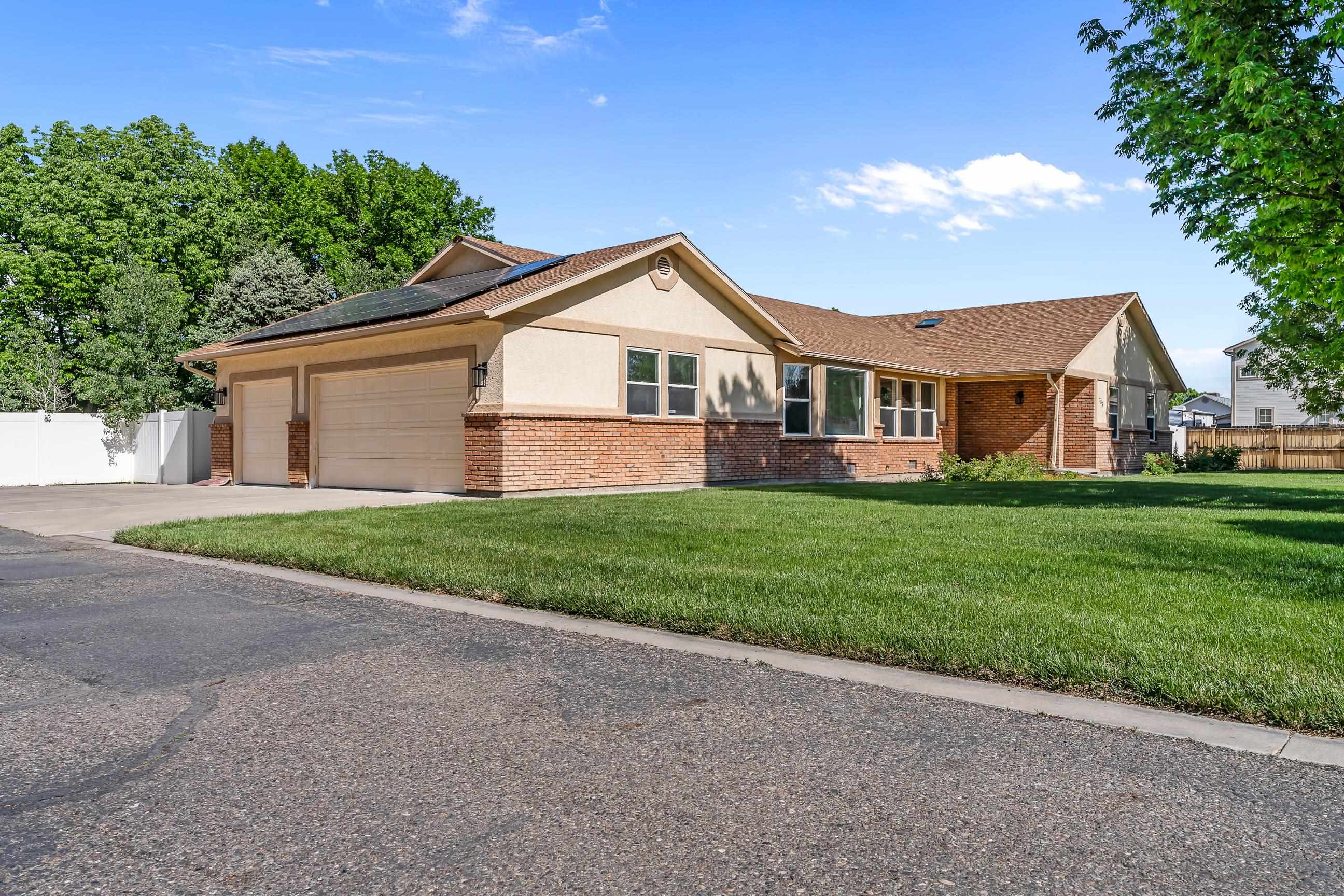705-24 24 3/4 Road Grand Junction, CO 81505 - Photo 19 of 27 a front view of house with yard and green space