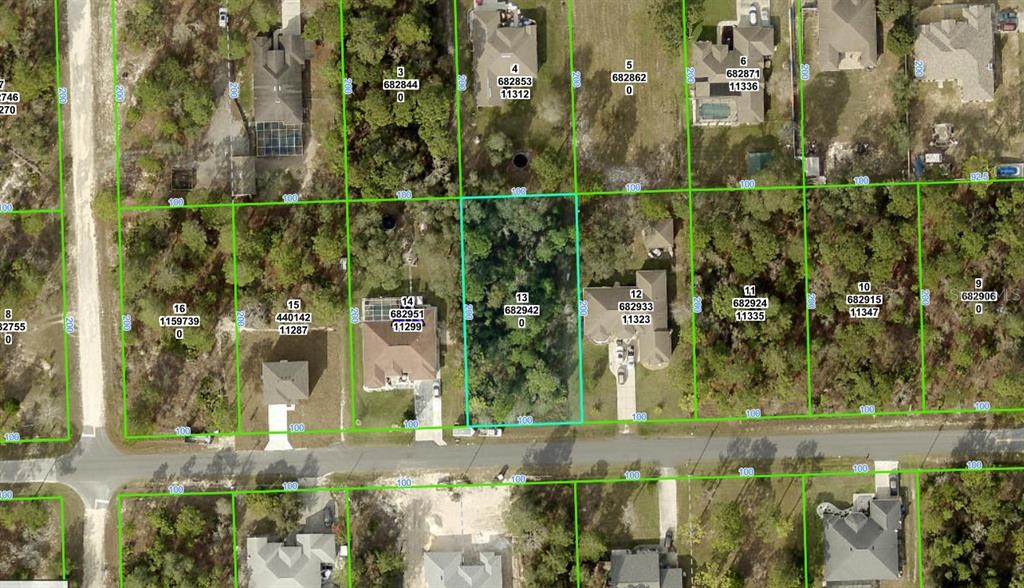 0 Flock Avenue Weeki Wachee, FL 34613 - Photo 1 of 1 front view of a house with a yard