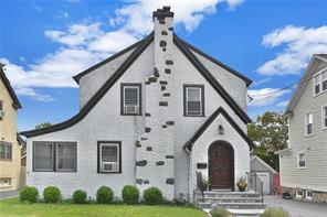 20 Rex Road Port Chester, NY 10573 - Photo 1 of 1 a front view of a house with garden