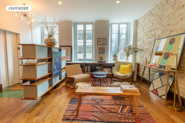 a picture of a bench in front of a building