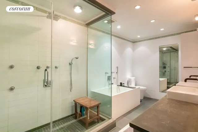 a living room with furniture a rug and a window