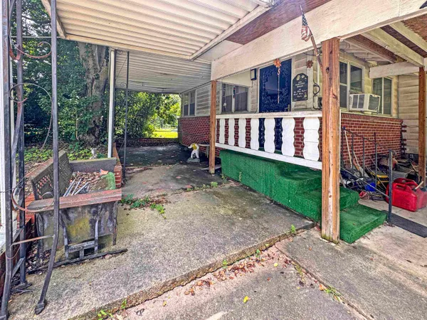 a view of a backyard with a garden
