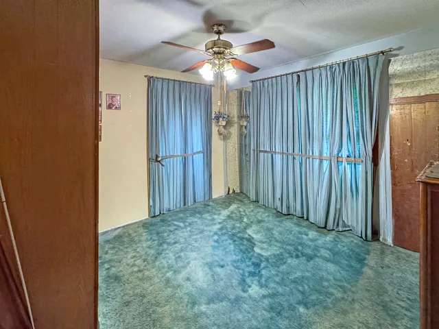 a bathroom with a tub and shower