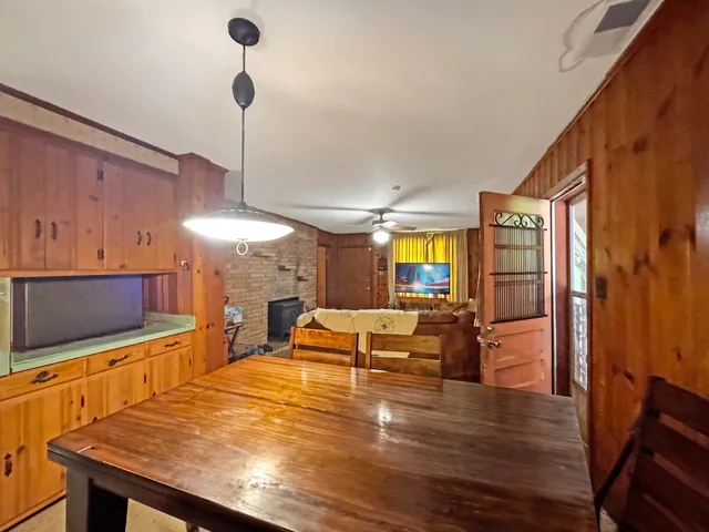 a view of a livingroom with furniture and entryway