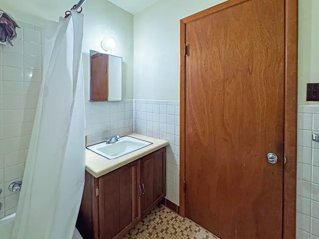 a bathroom with a toilet and a sink