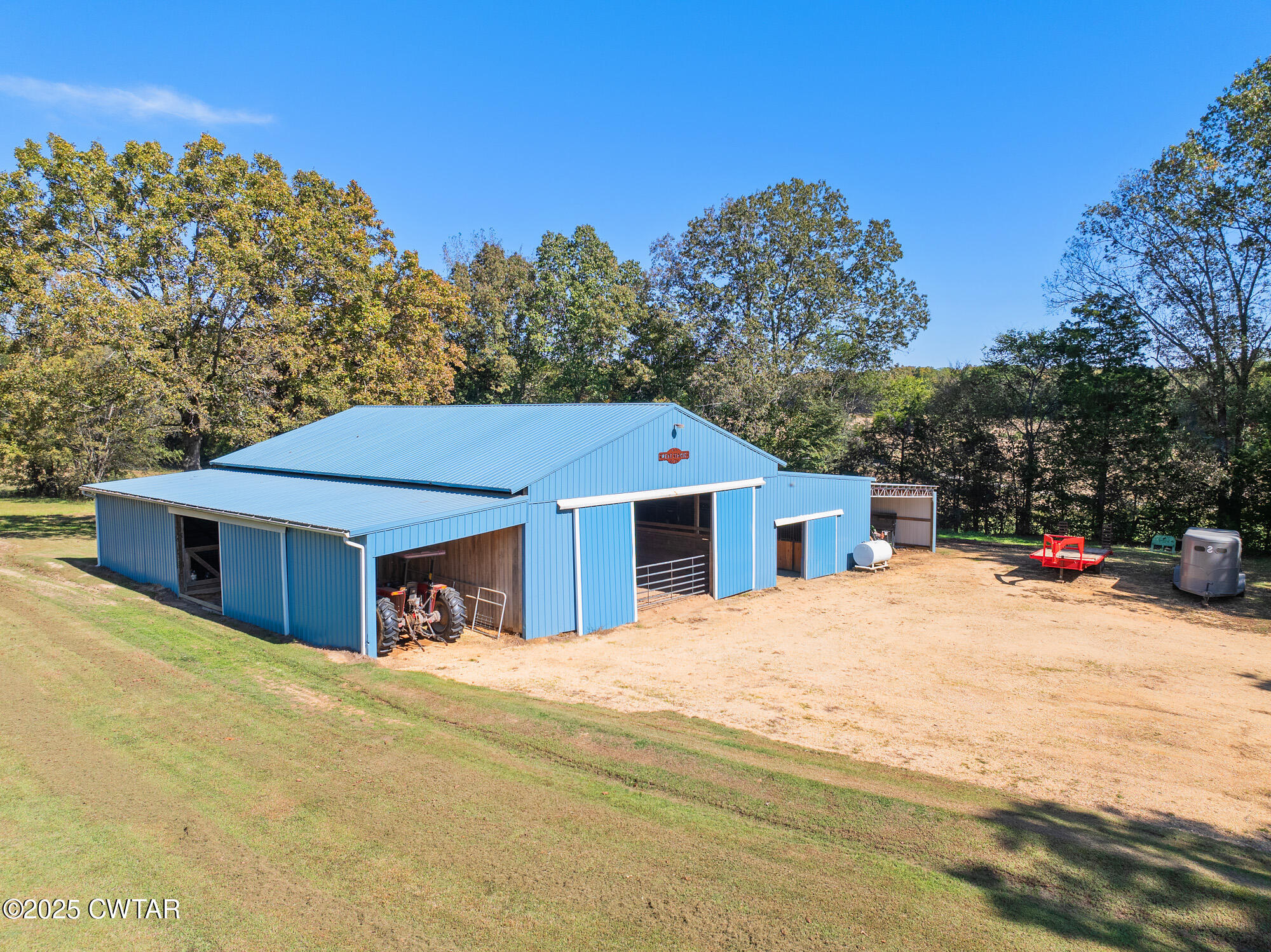 3685 Henderson Road Sardis, TN 38371 - Photo 33 of 46 a house with trees in the background