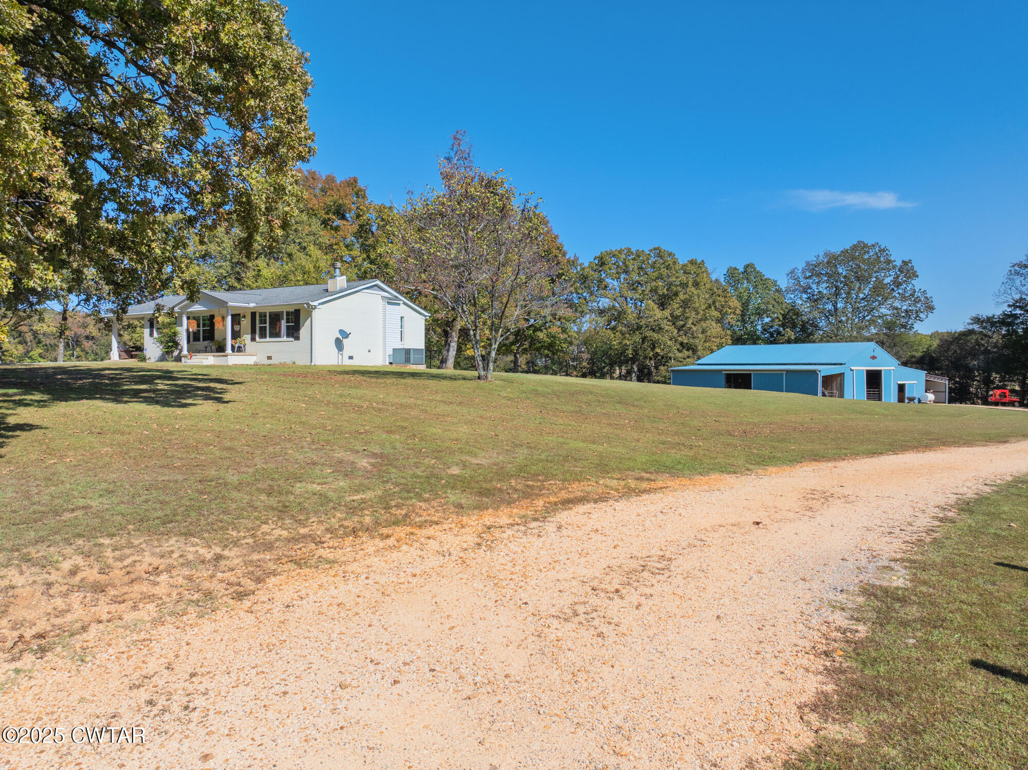 3685 Henderson Road Sardis, TN 38371 - Photo 38 of 46 a view of large trees with yard in front of house