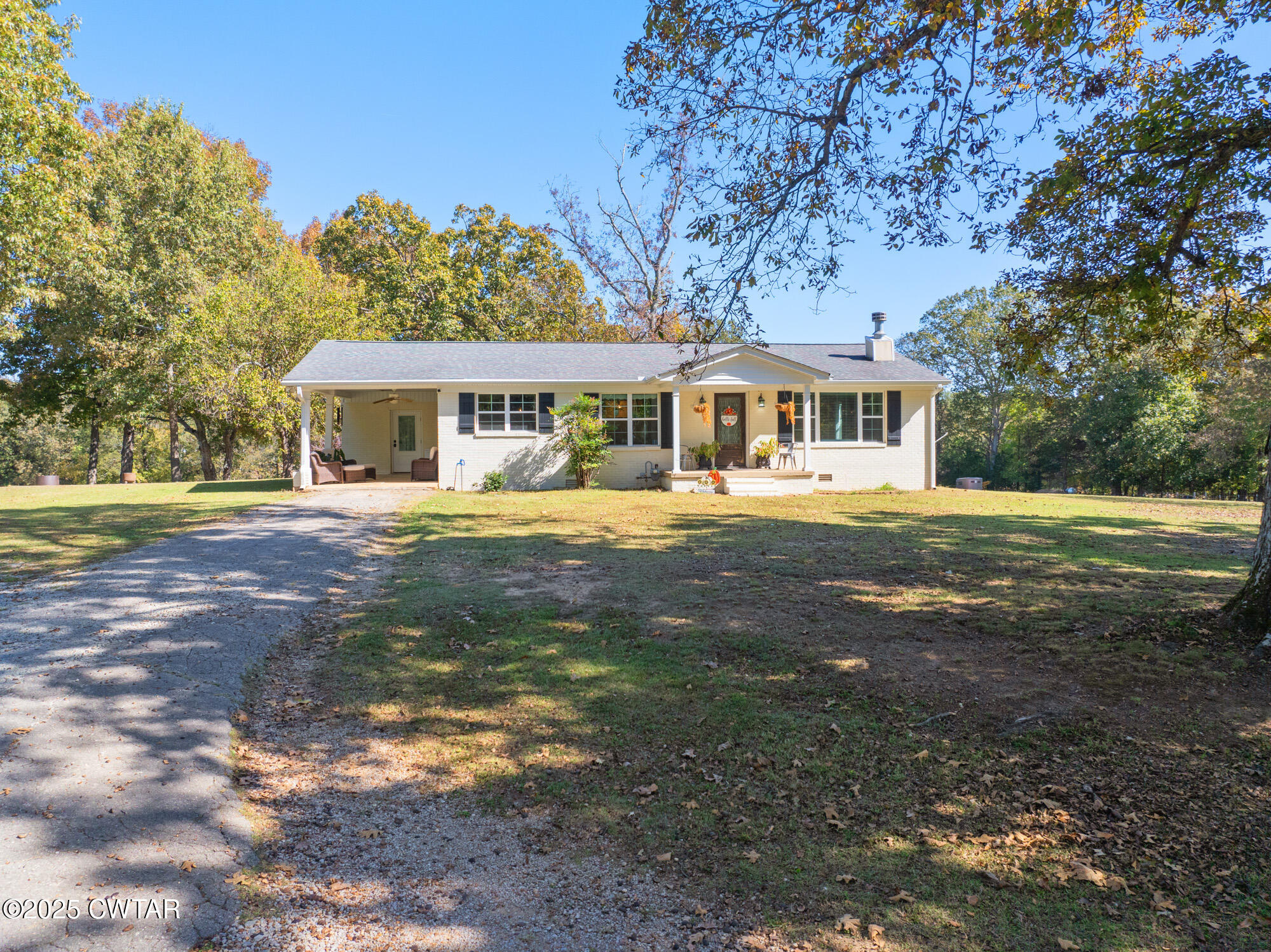 3685 Henderson Road Sardis, TN 38371 - Photo 5 of 46 a front view of a house with a yard