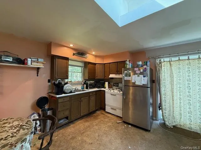 a room with lots of furniture and windows