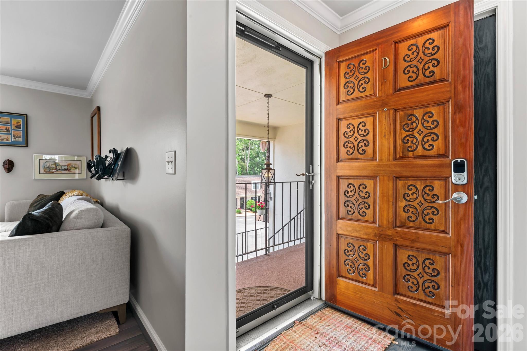 3520 Colony Road, Unit D Charlotte, NC 28211 - Photo 13 of 25 a view of front door with wooden floor