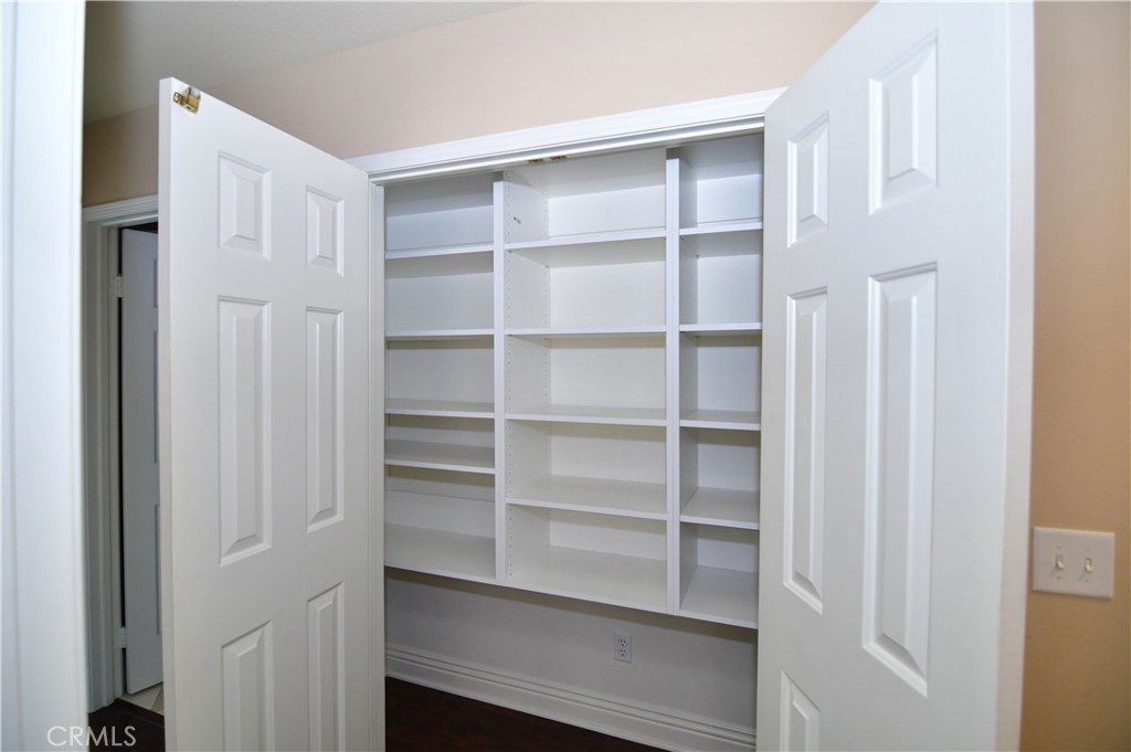 3 Ei Corzo Rancho Santa Margarita, CA 92688 - Photo 15 of 31 a view of walk in closet with empty racks