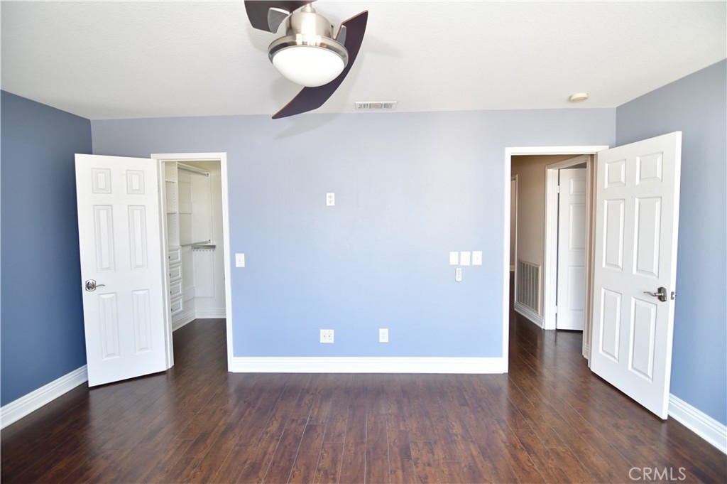 3 Ei Corzo Rancho Santa Margarita, CA 92688 - Photo 17 of 31 an empty room with wooden floor and mirror