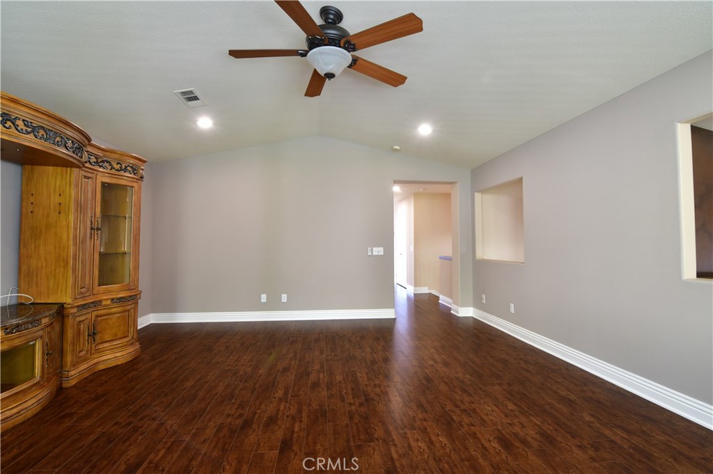 3 Ei Corzo Rancho Santa Margarita, CA 92688 - Photo 30 of 31 a view of an empty room with wooden floor and a window