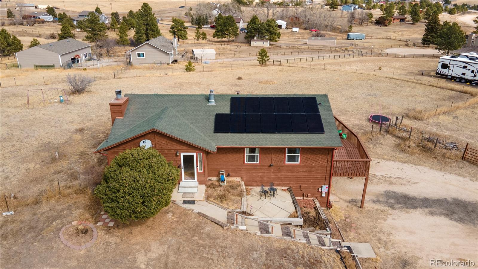 2141 Remington Road Elizabeth, CO 80107 - Photo 1 of 42 an aerial view of a house with a yard basket ball court and outdoor seating