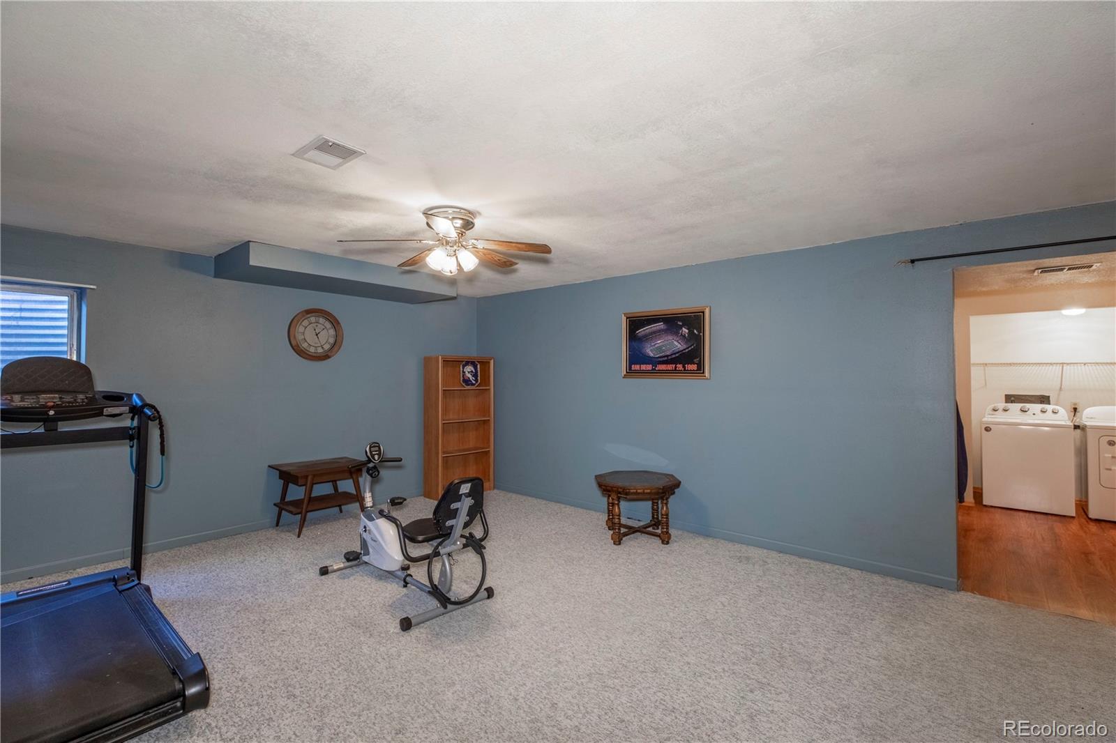 2141 Remington Road Elizabeth, CO 80107 - Photo 18 of 42 a view of a livingroom with furniture and a chair