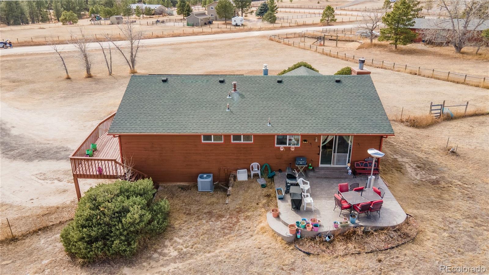 2141 Remington Road Elizabeth, CO 80107 - Photo 2 of 42 an aerial view of a house with outdoor space