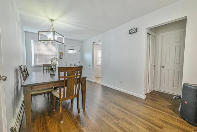 a kitchen with stainless steel appliances granite countertop a stove microwave and sink