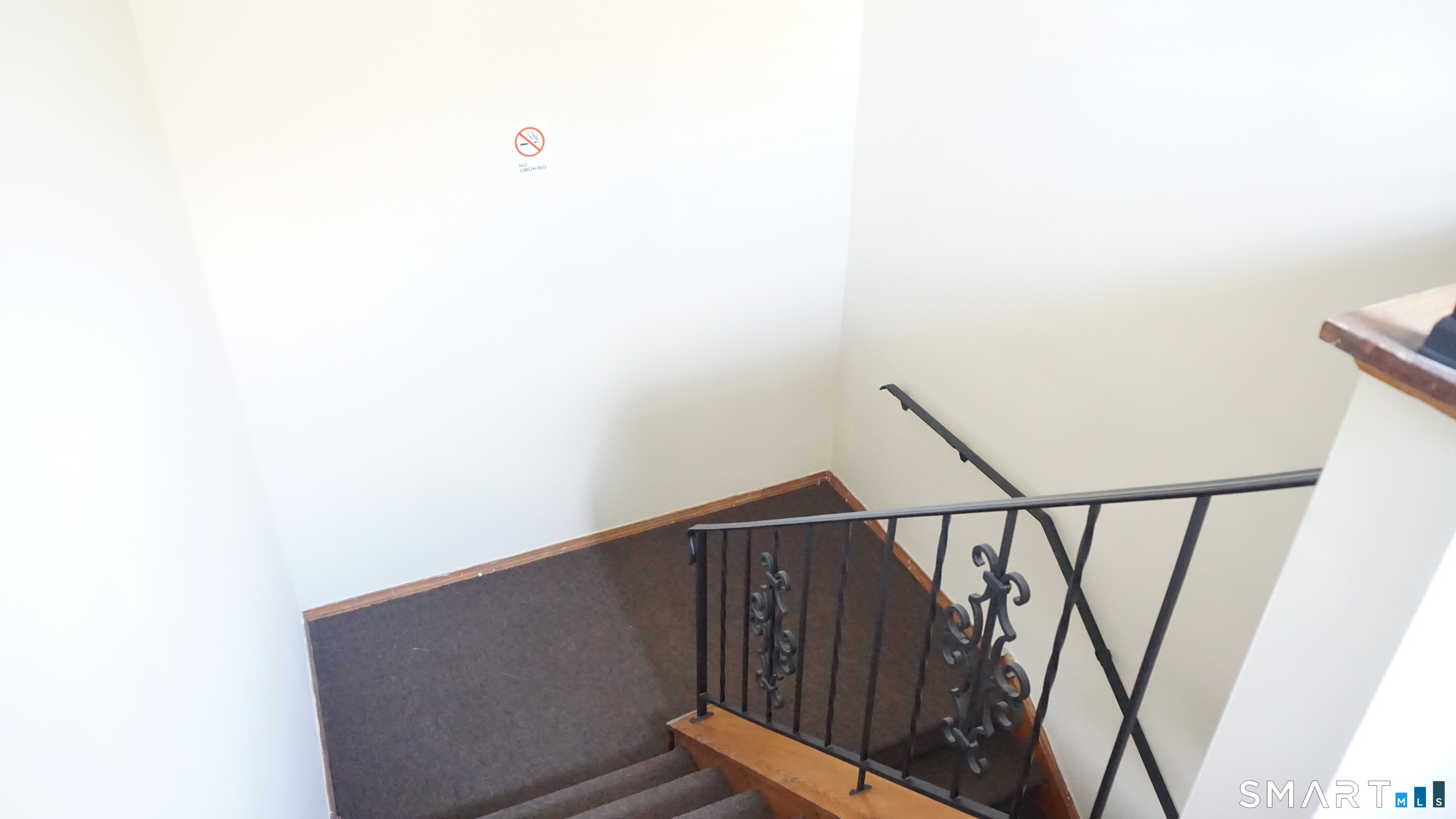 28 Sampson Street, Unit 4 Bridgeport, CT 06606 - Photo 20 of 30 a view of staircase with rug