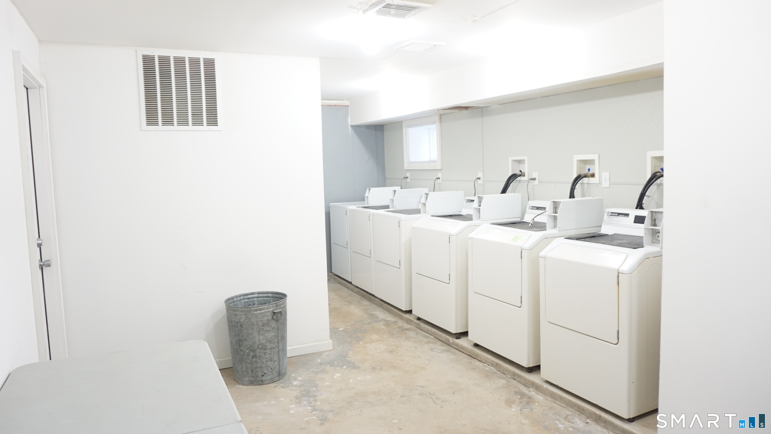 28 Sampson Street, Unit 4 Bridgeport, CT 06606 - Photo 24 of 30 a utility room with dryer and washer