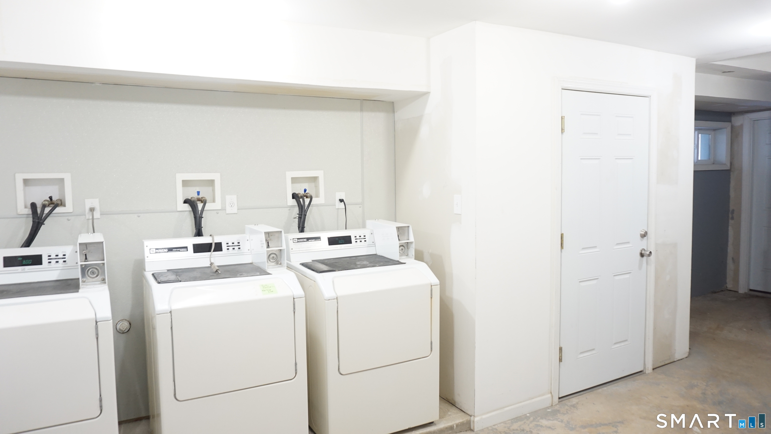 28 Sampson Street, Unit 4 Bridgeport, CT 06606 - Photo 25 of 30 a utility room with dryer and washer