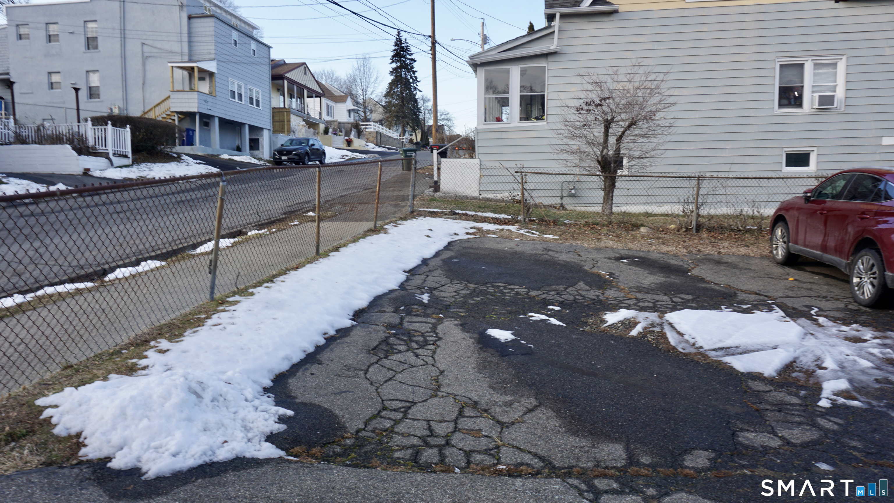 28 Sampson Street, Unit 4 Bridgeport, CT 06606 - Photo 27 of 30 a view of a house with a yard