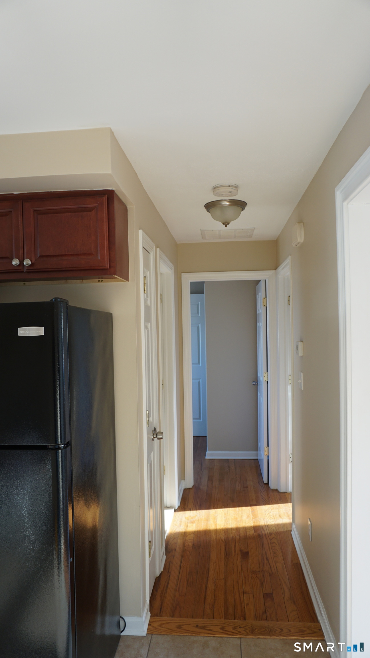 28 Sampson Street, Unit 4 Bridgeport, CT 06606 - Photo 10 of 30 a view of room with door