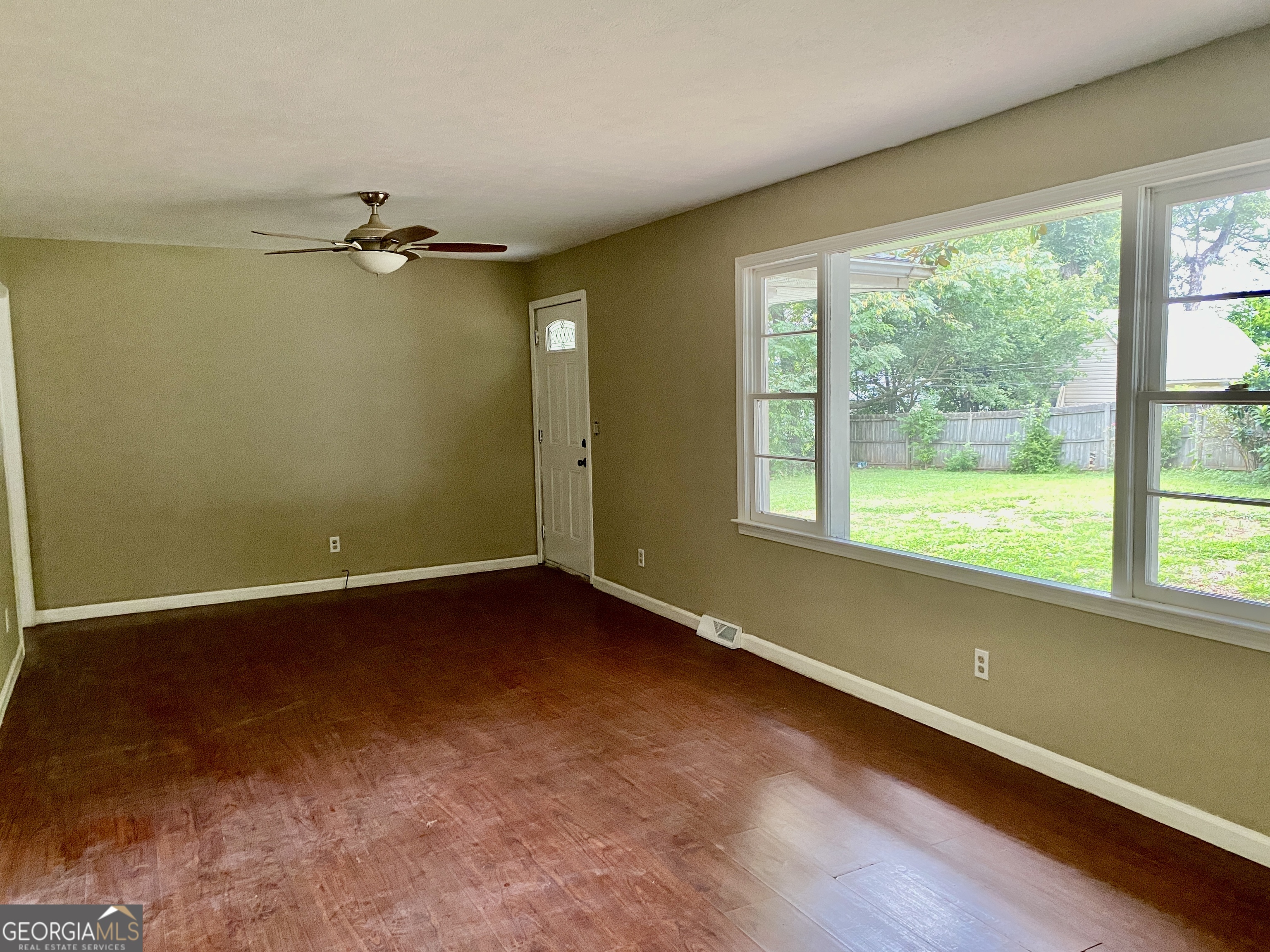 514 Booze Mountain Road Southeast Lindale, GA 30161 - Photo 5 of 13 a view of a room with a large window
