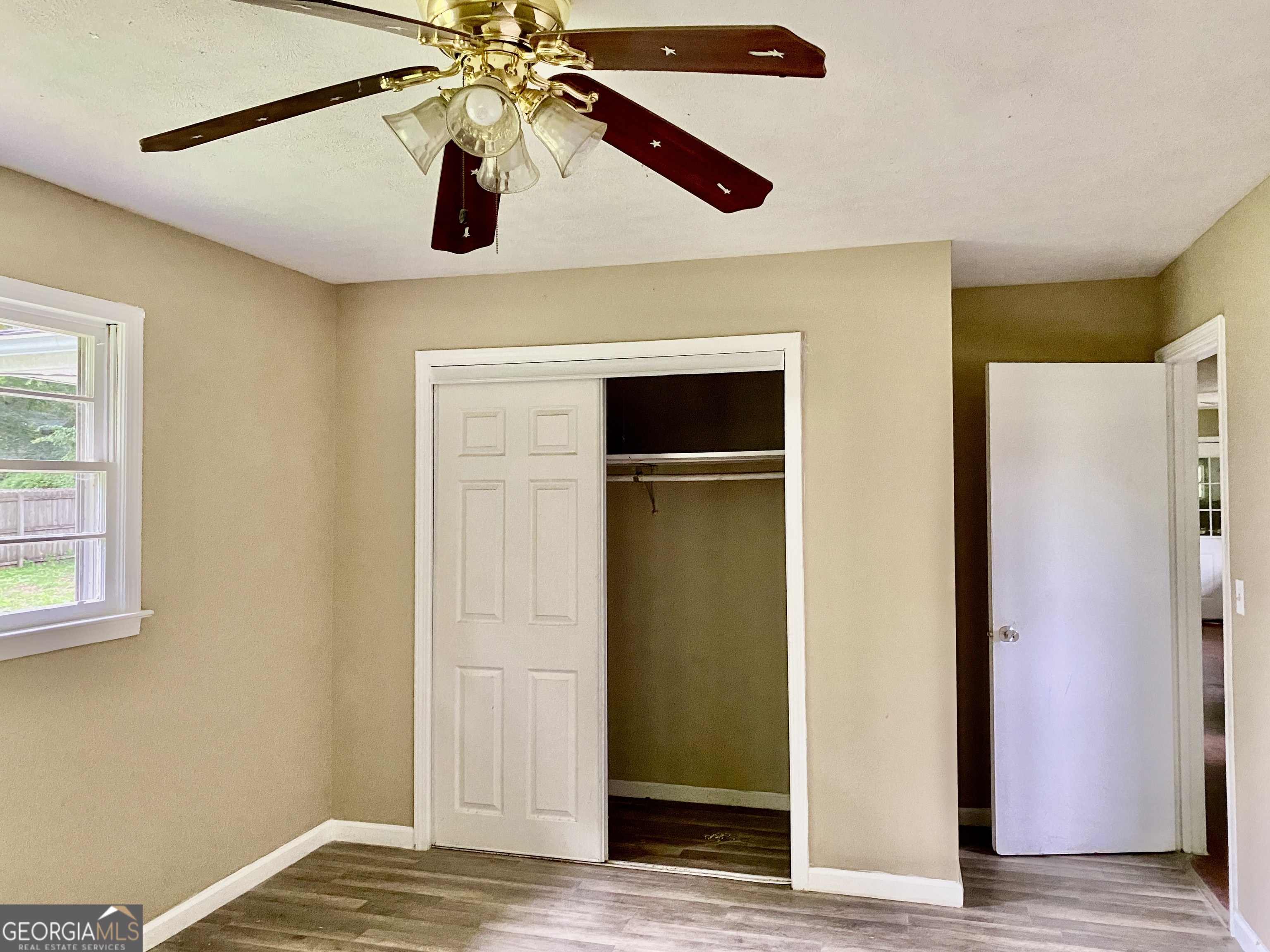 514 Booze Mountain Road Southeast Lindale, GA 30161 - Photo 10 of 13 a view of empty room with wooden floor